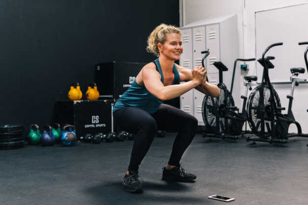 Fitness Female Indoors Gym Cross-Fit Squat Glutes 