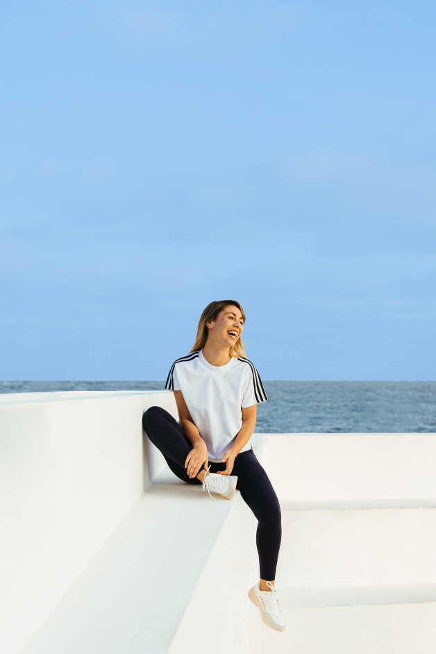 active female sitting outdoors